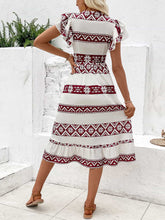 Robe imprimée à col en V et manches flottantes
